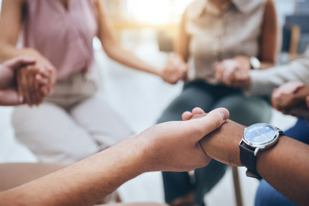 Hands, Prayer And Trust With People Together In A Support Group For Help, Trust Or Worship In Spiri